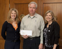 Entergy presents check for Chefs Evening